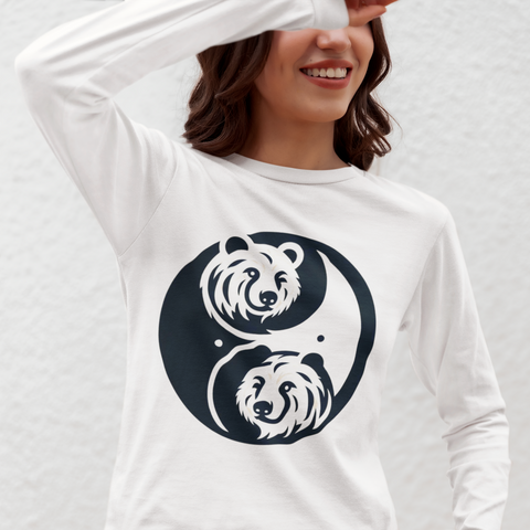 girl wearing a white long sleeve shirt with a blue and white bear yin and yang symbol